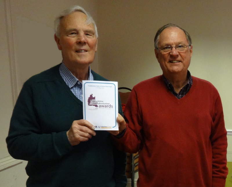 Secretary, Peter Bee, and Chairman, Peter Brading, hold a copy of the OCVA Awards Programme.