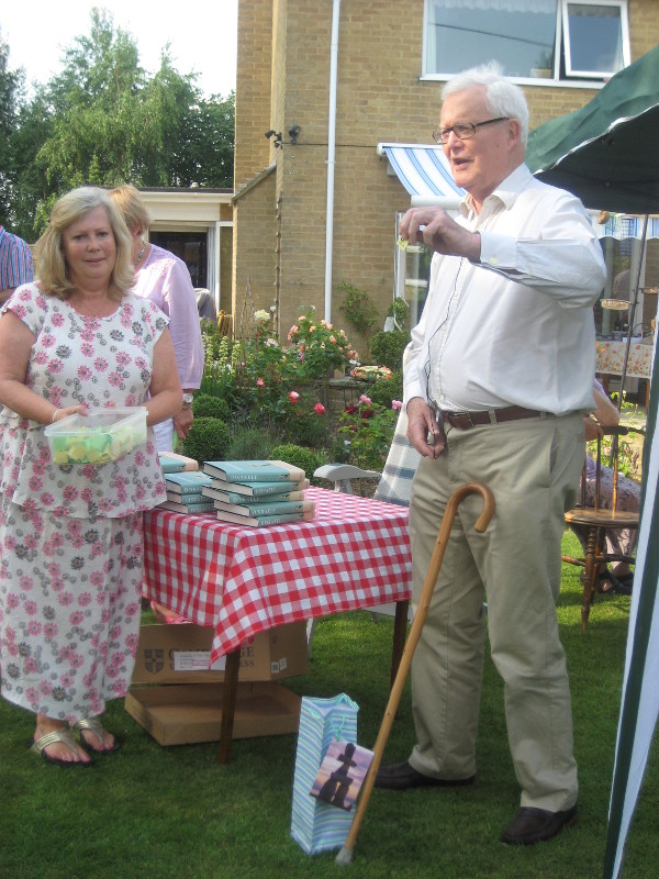 The raffle is drawn by Lord Hurd from a container of tickets held by a WTN committee member.