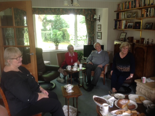 Members of the WTN committee share coffee and cake with long-term volunteer Jane Holmes as she leaves Witney and WTN.